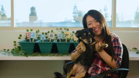 FlyQuest CEO Tricia Sugita with an adorable dog